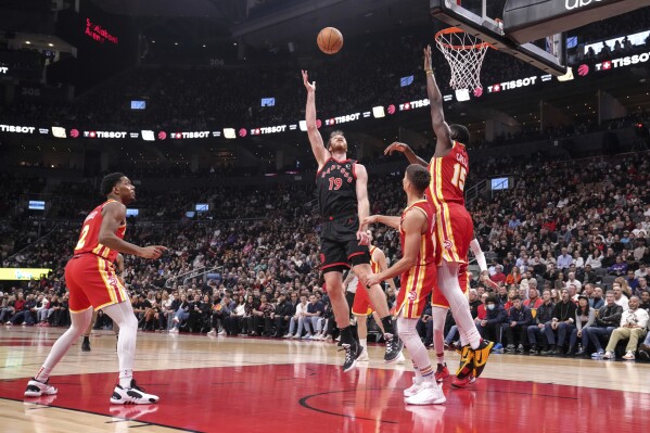 Young scores 38 points Hawks beat Raptors 125 104 to end five